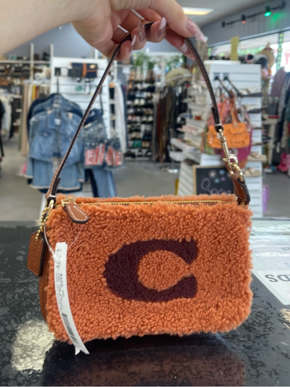 Coach Orange Shearling Mini Wristlet with Dark Logo